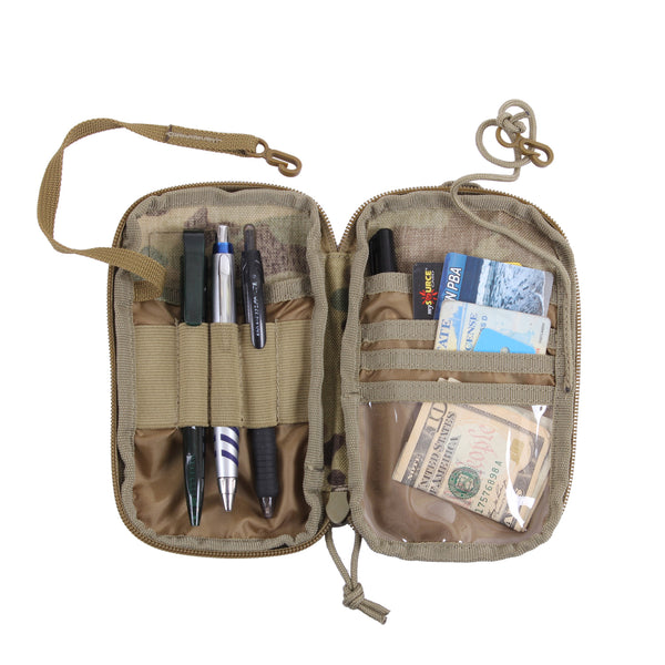 Rothco’s MOLLE EDC wallet and cell phone pouch (MultiCam) in the open configuration showing the lanyards, interior compartments and utility retainers with sample contents.