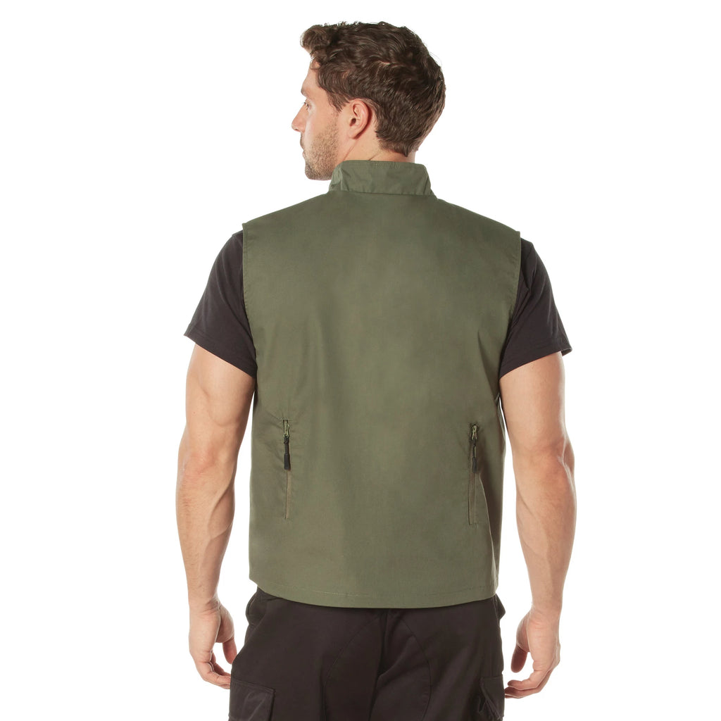 Man wearing a green vest on a white background