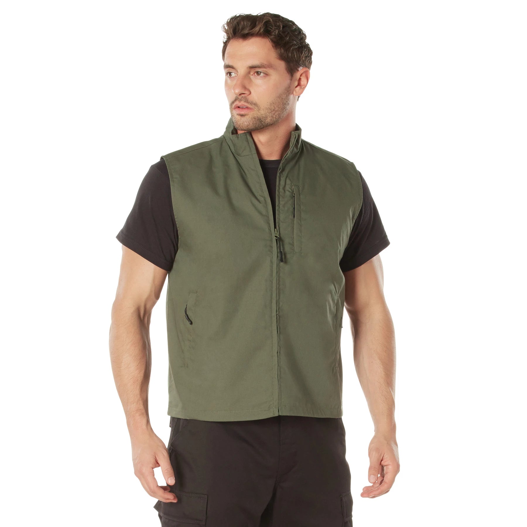Man wearing a green vest over a black shirt on a white background