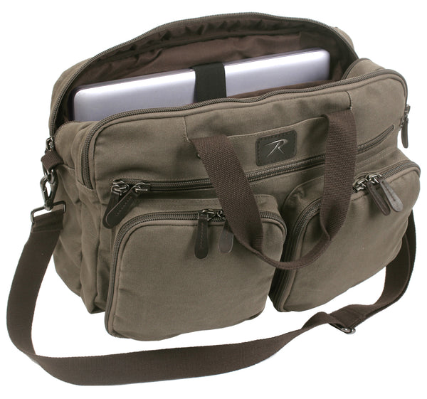 Rothco’s convertible laptop briefcase computer backpack, oblique top and front view in the briefcase/shoulder bag configuration with the rear main compartment open showing a sample laptop computer and the hook & loop securing strap.