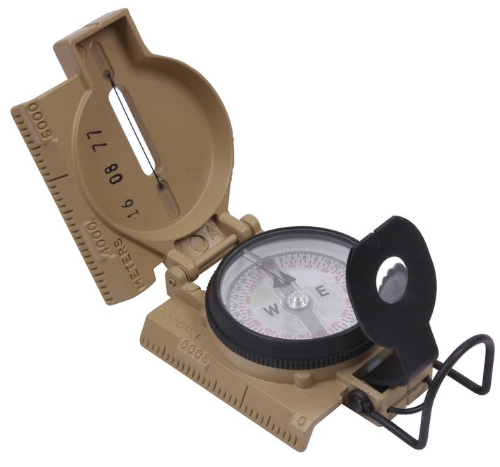 Cammenga Military Phosphorescent Lensatic Compass, oblique view showing the dial, sighting system, thumb loop, foldable casing and map scales. Color: brown.