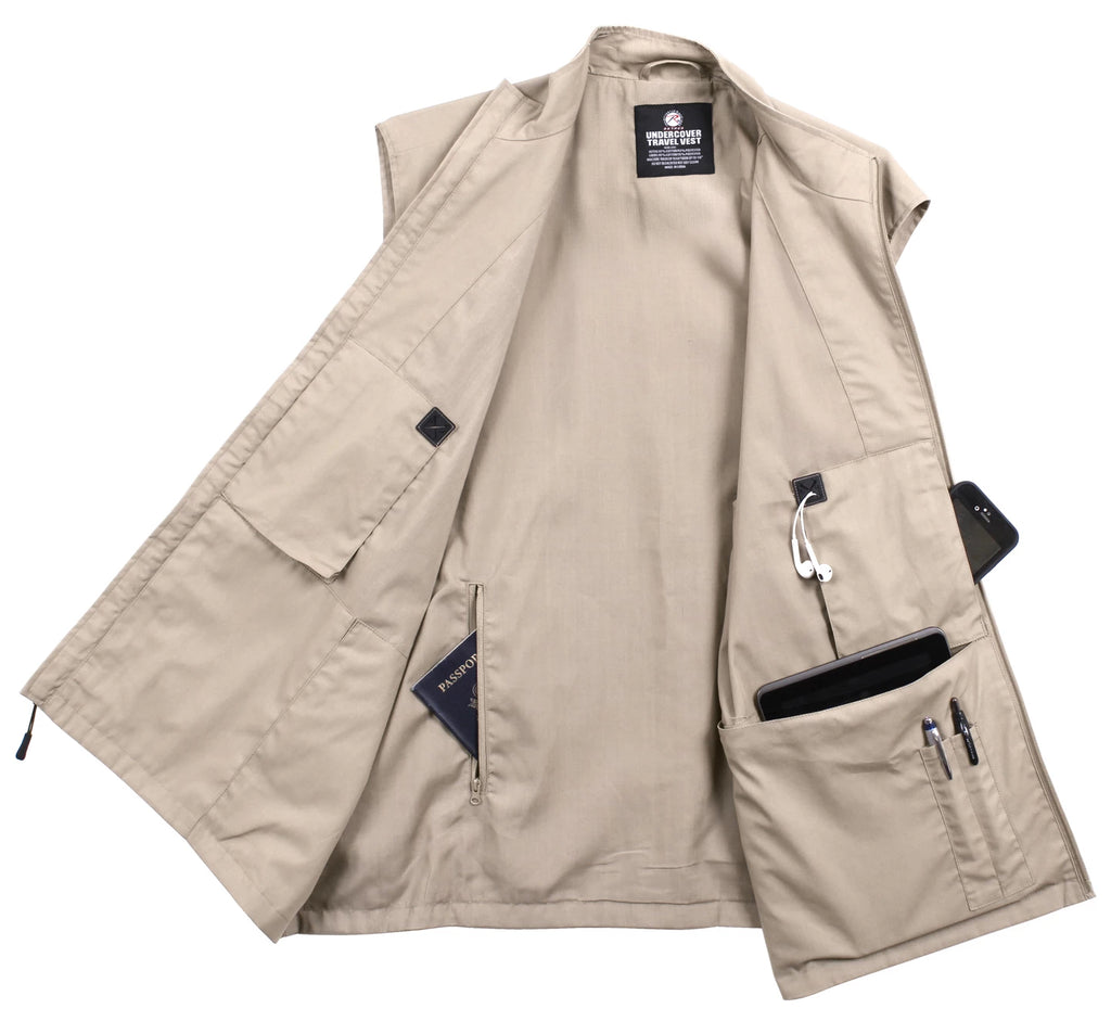 Beige vest with multiple pockets and a brand label on a white background