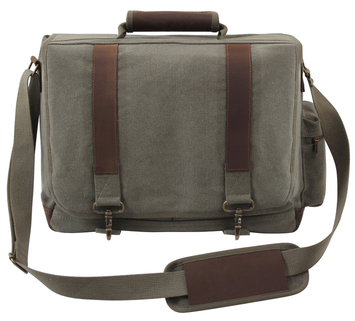 Rothco's Vintage Canvas Pathfinder Laptop Bag (Olive), front view in the closed configuration showing top carry handle, shoulder strap, side zippered pocket, weather flap with antique brass closures and leather accents.