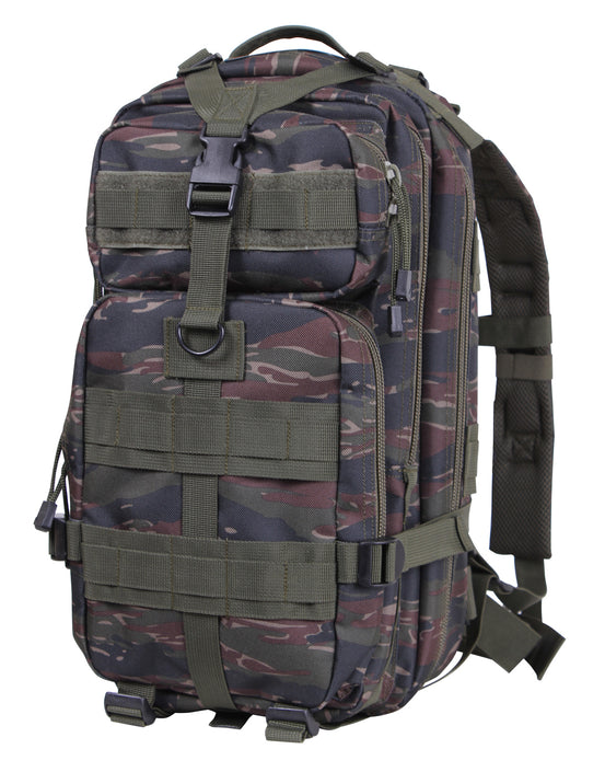 Rothco’s Medium Transport Tactical Backpack (Tiger Stripes), oblique view showing padded shoulder straps, chest strap, lifting handle, the layering of this backpack’s many compartments, one of 2 depth expansion and securing straps, 3 rows of MOLLE utility loops and the rear-facing loop field for morale patches.