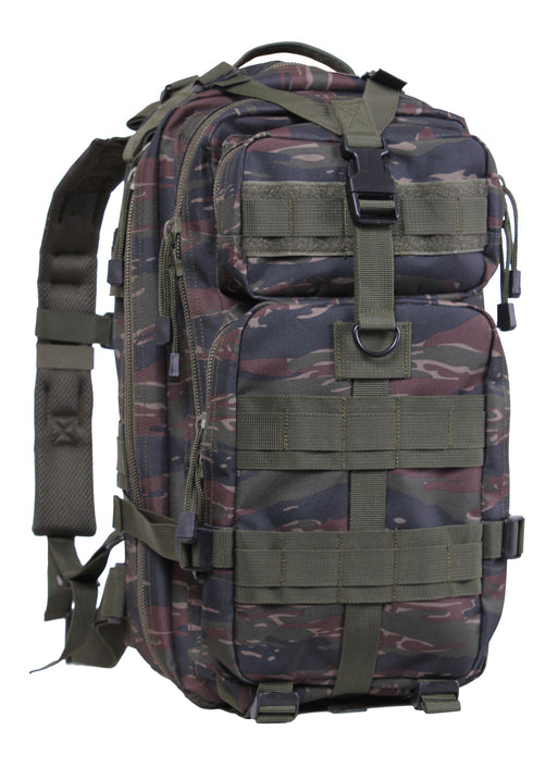 Rothco’s Medium Transport Tactical Backpack (Tiger Stripes), oblique view showing padded shoulder straps, lifting handle, the layering of this backpack’s many compartments, one of 2 depth expansion and securing straps, 3 rows of MOLLE utility loops and the rear-facing loop field for morale patches.