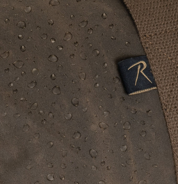 Rothco’s Medium Transport Tactical Backpack, detail view showing water-resistant polyester fabric and a tastefully understated Rothco garment tag.