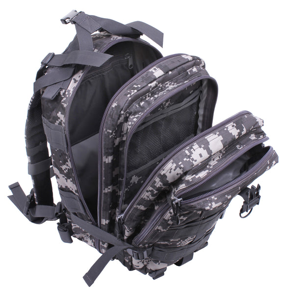 Rothco’s Medium Transport Tactical Backpack (Urban Digital), oblique top view with several compartments open showing padded shoulder straps, lifting handle, the layering of compartments and the function of one of 2 depth expansion and securing straps.