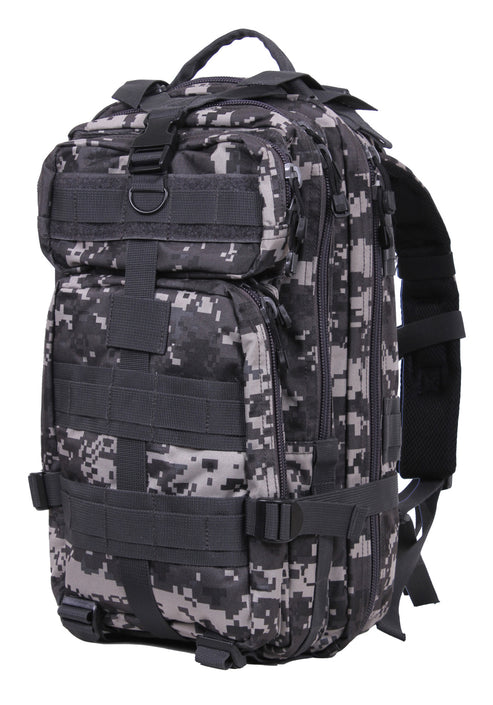 Rothco’s Medium Transport Tactical Backpack (Urban Digital), oblique view showing padded shoulder straps, chest strap, lifting handle, the layering of this backpack’s many compartments, one of 2 depth expansion and securing straps, 3 rows of MOLLE utility loops and the rear-facing loop field for morale patches.