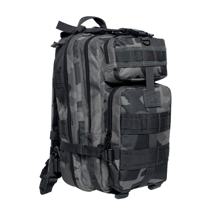 Rothco’s Medium Transport Tactical Backpack (Midnight Camo), oblique view showing padded shoulder straps, chest strap, lifting handle, the layering of this backpack’s many compartments, one of 2 depth expansion and securing straps, 3 rows of MOLLE utility loops and the rear-facing loop field for morale patches.