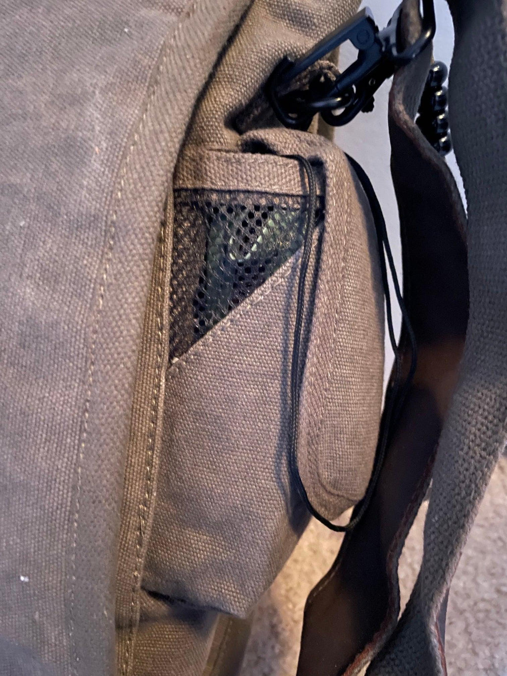 Rothco Vintage M-51 Engineer’s / Birdwatching Bag with Leather Accents, showing the Larger of the two Hook and Loop Side Pockets.