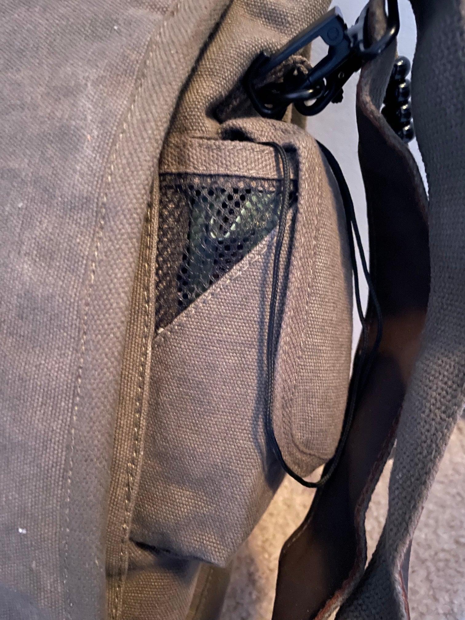 Rothco Vintage M-51 Engineer’s / Birdwatching Bag with Leather Accents, showing the Larger of the two Hook and Loop Side Pockets.