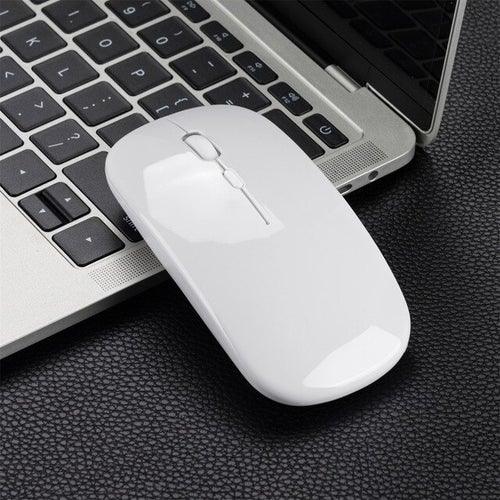 USB Optical Wireless Computer Mouse 2.4GHz (white), juxtaposed with a MacBook computer